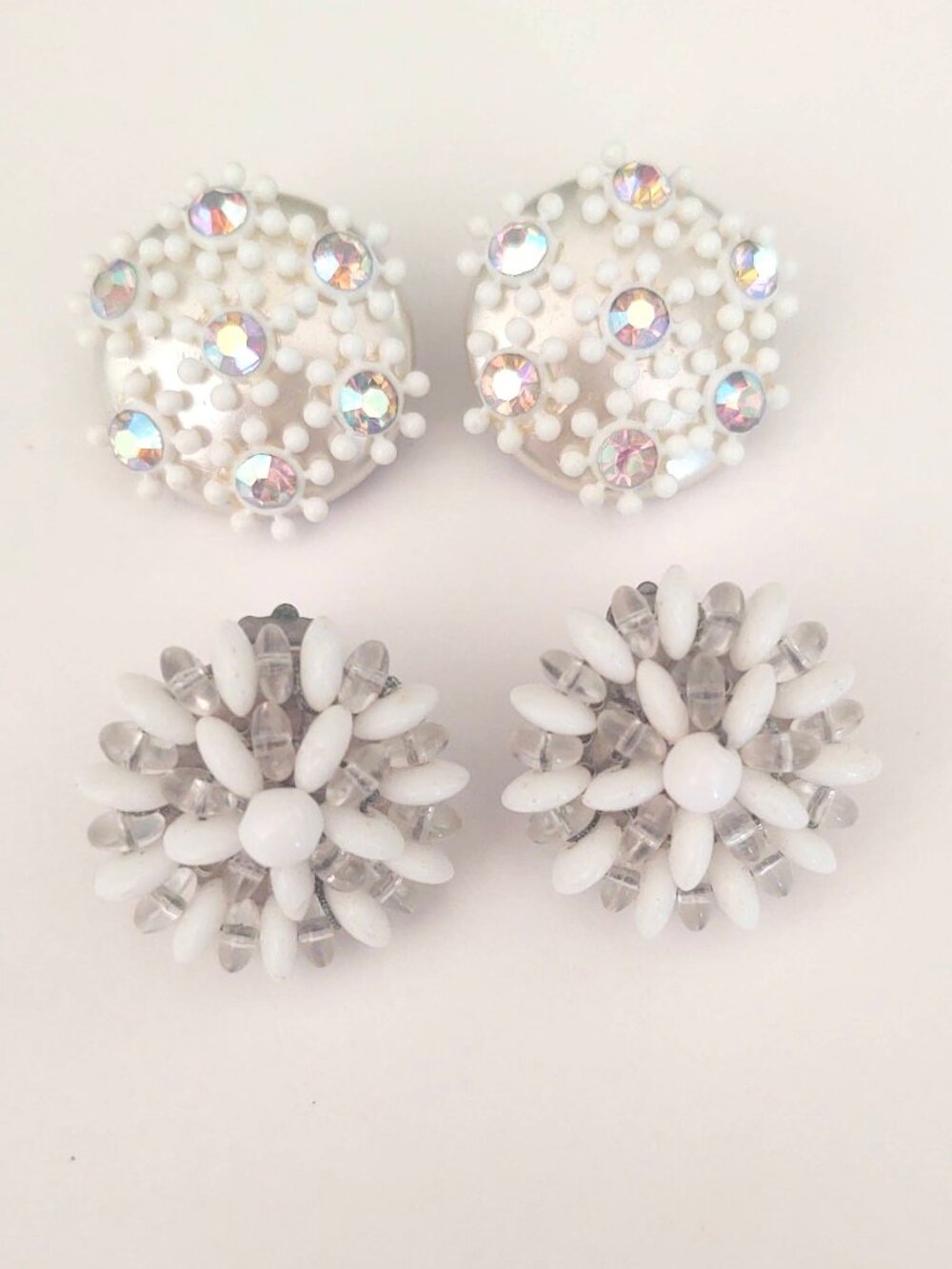 2 pairs of vintage white clip on earrings